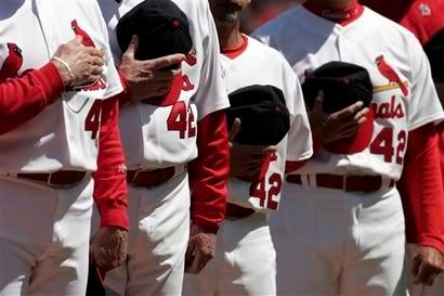 The St. Louis Cardinals line up for the National Anthem on Jackie Robinson Day.